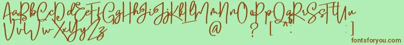 Lobsters Blush Bold free-fontti – ruskeat fontit vihreällä taustalla