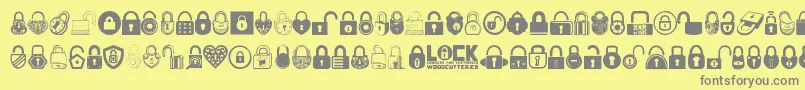 Lock-fontti – harmaat kirjasimet keltaisella taustalla