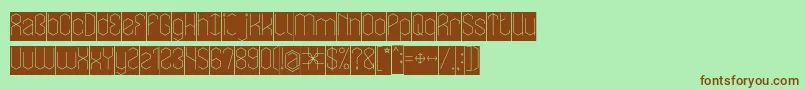 LOIS CESARANO Inverse-fontti – ruskeat fontit vihreällä taustalla