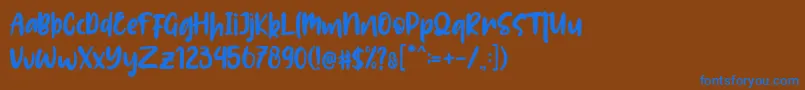 Lolitta-fontti – siniset fontit ruskealla taustalla