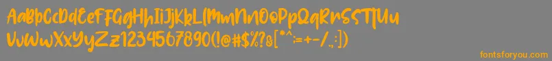 Lolitta Font – Orange Fonts on Gray Background