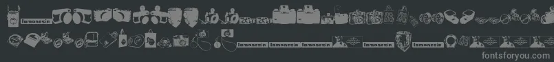 Czcionka Lomonesia  Dingbats – szare czcionki na czarnym tle