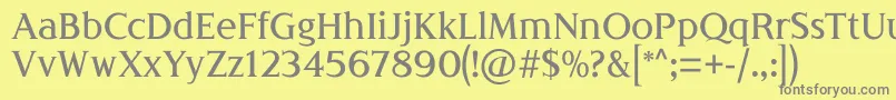 フォントLondiniaMedium – 黄色の背景に灰色の文字