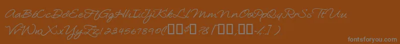 フォントLoosiescript – 茶色の背景に灰色の文字
