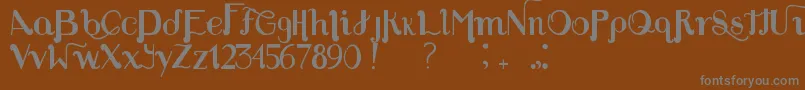 Louie s Font-fontti – harmaat kirjasimet ruskealla taustalla