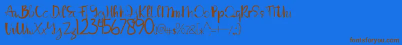 LouiseAnn Font – Brown Fonts on Blue Background
