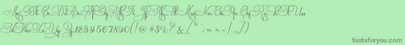 フォントLouizede – 緑の背景に灰色の文字