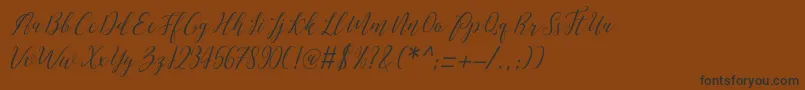 Love Maliaフォントについての詳細 フォントLove Malia – 黒い文字が茶色の背景にあります