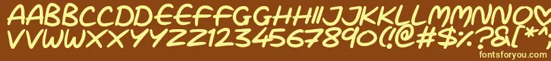 Love Marker-fontti – keltaiset fontit ruskealla taustalla