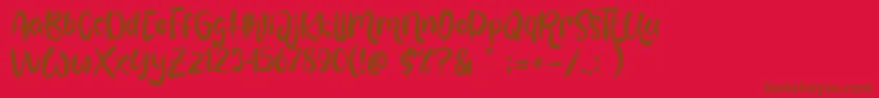 Love Mint-Schriftart – Braune Schriften auf rotem Hintergrund