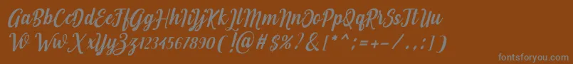 Love of Yellow-Schriftart – Graue Schriften auf braunem Hintergrund