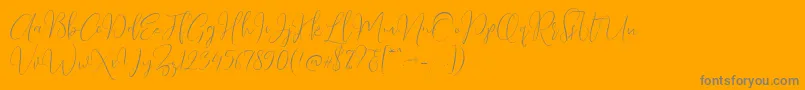 Love Surely DF-Schriftart – Graue Schriften auf orangefarbenem Hintergrund