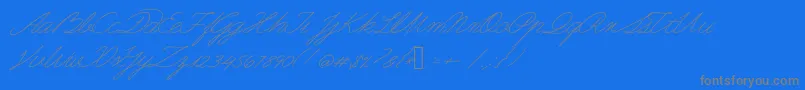フォントGuayaquil1800 – 青い背景に灰色の文字