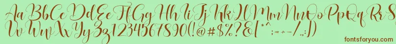 Lovea Font – Brown Fonts on Green Background