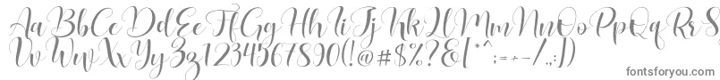 Lovea-fontti – harmaat kirjasimet valkoisella taustalla