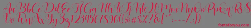 フォントLovea – 赤い文字の灰色の背景