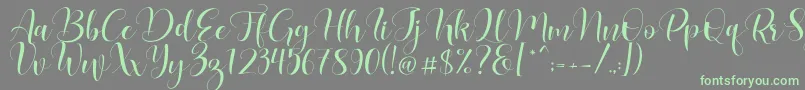 Lovea Font – Green Fonts on Gray Background