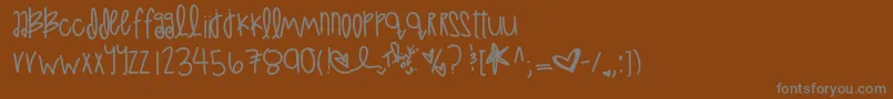 LoveAtFirstSight Font – Gray Fonts on Brown Background