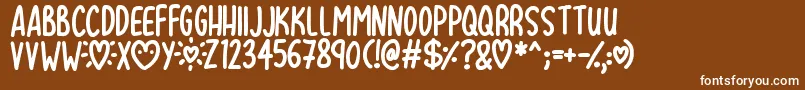 Więcej informacji o czcionce Lovehearts XYZ Czcionka Lovehearts XYZ – białe czcionki na brązowym tle