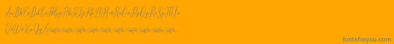 Lovelique Demo-Schriftart – Graue Schriften auf orangefarbenem Hintergrund