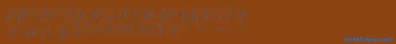 Lovellyana Free Font – Blue Fonts on Brown Background
