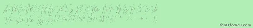 Lovellyana Free Font – Gray Fonts on Green Background