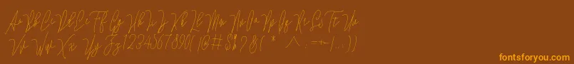 fuente Lovellyana Free – Fuentes Naranjas Sobre Fondo Marrón