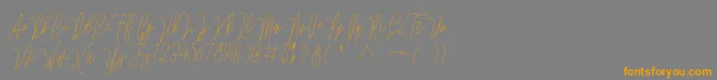 Lovellyana Free Font – Orange Fonts on Gray Background