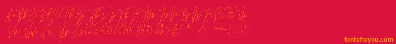 フォントLovellyana Free – 赤い背景にオレンジの文字