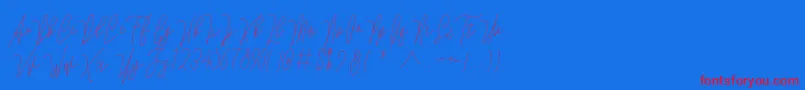フォントLovellyana Free – 赤い文字の青い背景