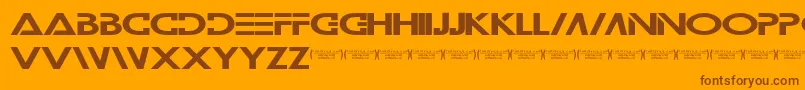 Wilamilita-Schriftart – Braune Schriften auf orangefarbenem Hintergrund