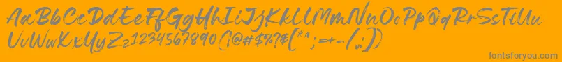 Czcionka Lovely Boys Font by 7NTypes D – szare czcionki na pomarańczowym tle