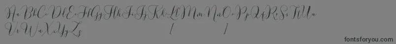 Lovely Dramatis Demo-Schriftart – Schwarze Schriften auf grauem Hintergrund