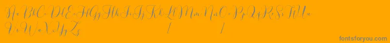 Lovely Dramatis Demo-Schriftart – Graue Schriften auf orangefarbenem Hintergrund