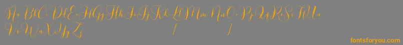 Lovely Dramatis Demo Font – Orange Fonts on Gray Background