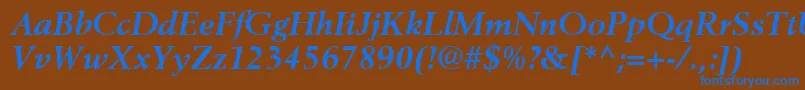 BerlingLtBoldItalic-Schriftart – Blaue Schriften auf braunem Hintergrund
