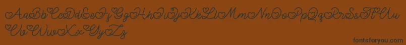 Lovely Valentine Font – Black Fonts on Brown Background