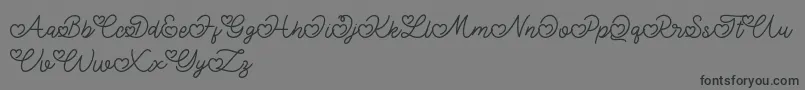 Lovely Valentine-Schriftart – Schwarze Schriften auf grauem Hintergrund