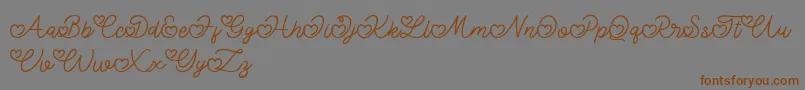Fonte Lovely Valentine – fontes marrons em um fundo cinza