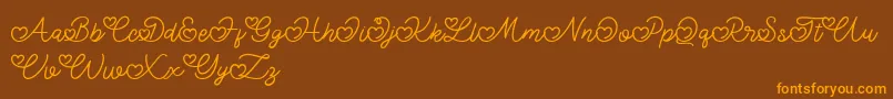 Czcionka Lovely Valentine – pomarańczowe czcionki na brązowym tle