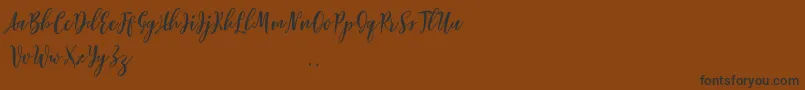 Lovelyou free Font – Black Fonts on Brown Background