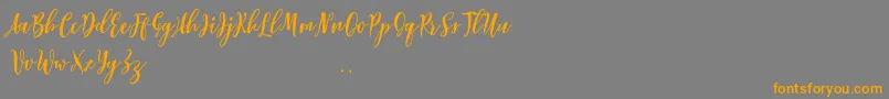Lovelyou free-Schriftart – Orangefarbene Schriften auf grauem Hintergrund