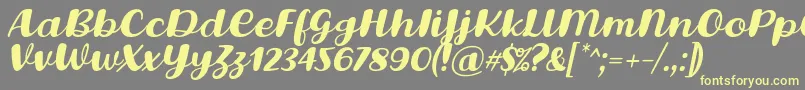 Lovina Octover Five Italic Font by Situjuh 7NTypes Font – Yellow Fonts on Gray Background
