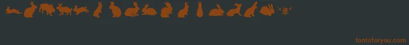 Шрифт lprabbits1 – коричневые шрифты на чёрном фоне