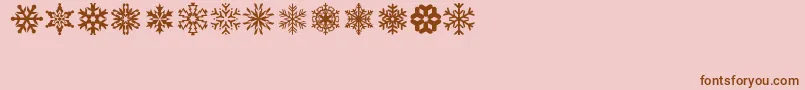 Fonte lpsnowflake – fontes marrons em um fundo rosa