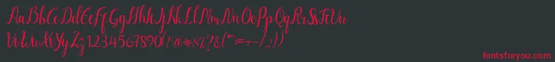 フォントLuciana Script – 黒い背景に赤い文字