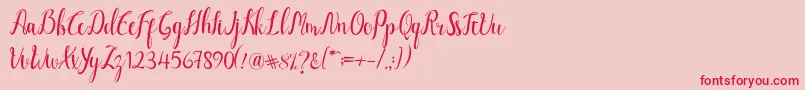 フォントLuciana Script – ピンクの背景に赤い文字