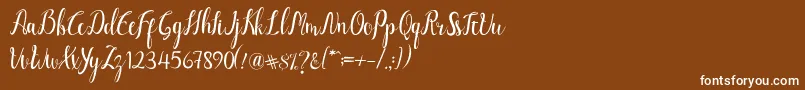 フォントLuciana Script – 茶色の背景に白い文字