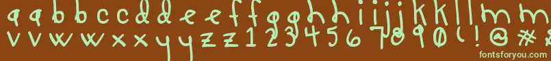 フォントLUCY LU, TOO – 緑色の文字が茶色の背景にあります。