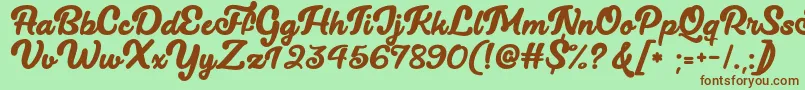 Lucy The Cat   Font – Brown Fonts on Green Background